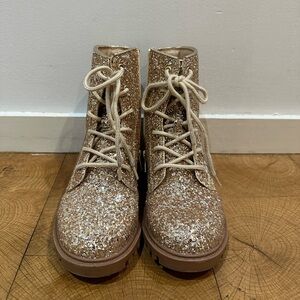 Girls sparkly gold combat boots.